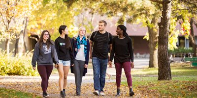 Students walking outside on USask campus grounds